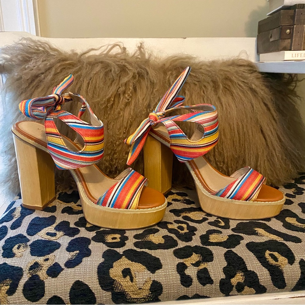 Very volatile tie back platform sandals